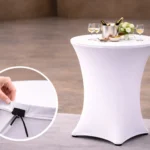 Detailansicht einer Stretchhaube für Stehtische, zeigt den elastischen Oberbezug, der passgenau über die runde Tischplatte gezogen wird