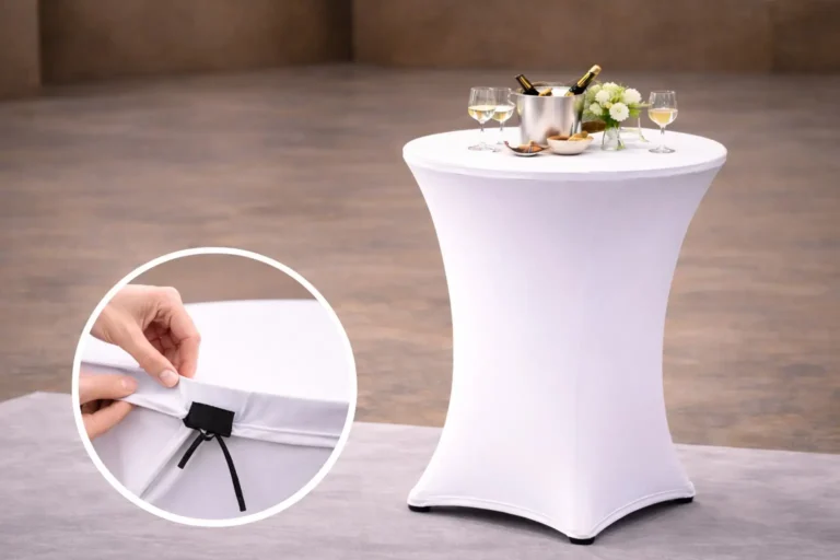 Detailansicht einer Stretchhaube für Stehtische, zeigt den elastischen Oberbezug, der passgenau über die runde Tischplatte gezogen wird